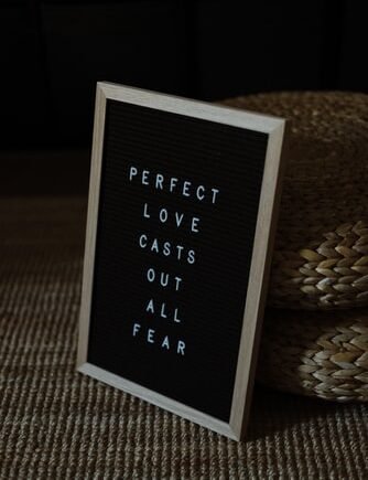 perfect love casts out fear frame