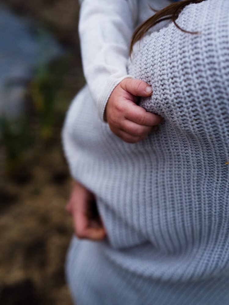 woman carrying baby